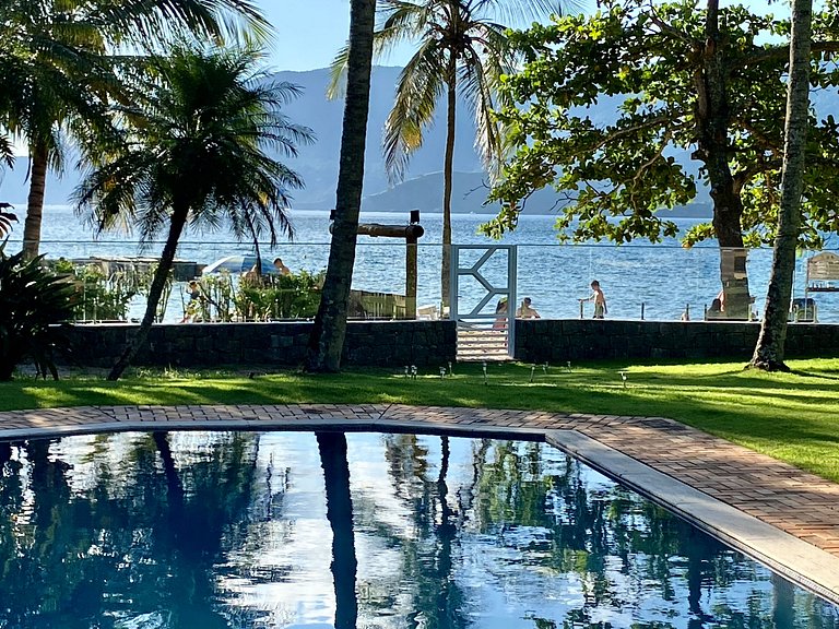 Casa pé na areia, piscina aquecida e área gourmet