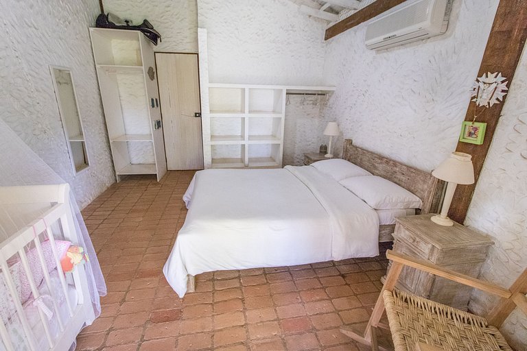 Casa em condomínio pé na areia, com área gourmet
