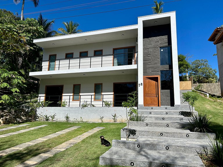 Casa moderna, condomínio pé na areia e piscina