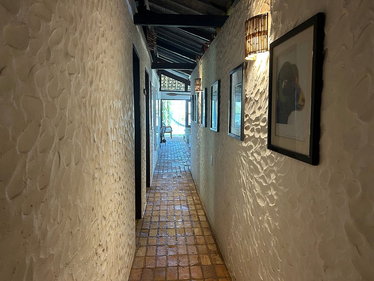 Casa em condomínio pé na areia, com área gourmet