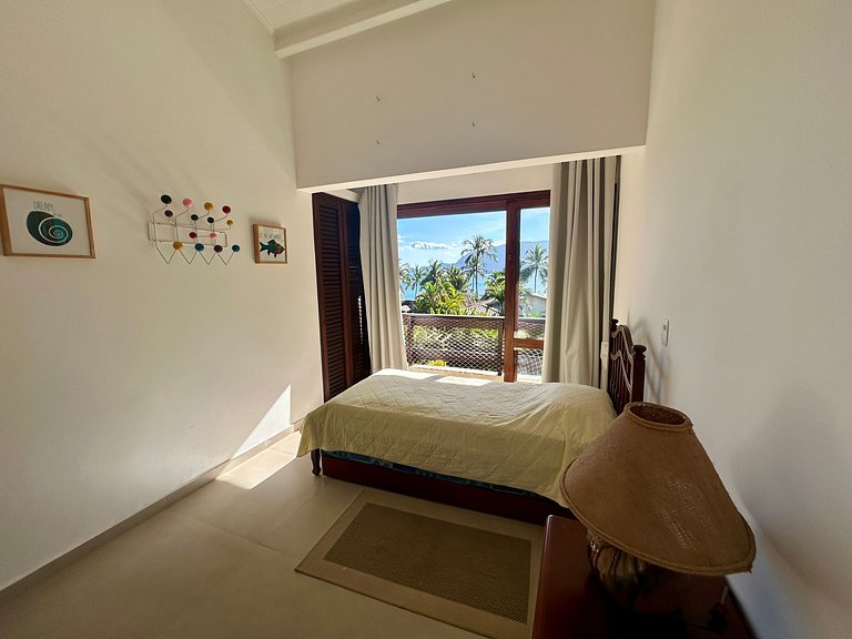Casa em condomínio pé na areia - 40m da praia