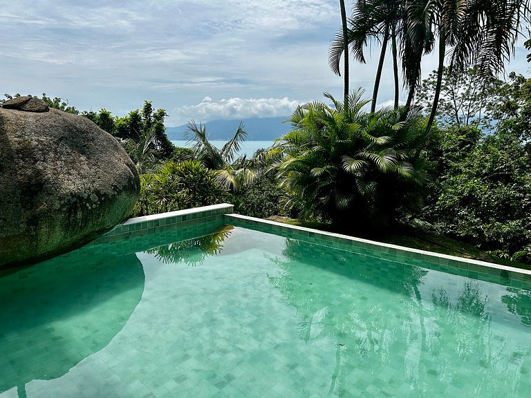 Experiência mar, montanha, piscina e churrasqueira