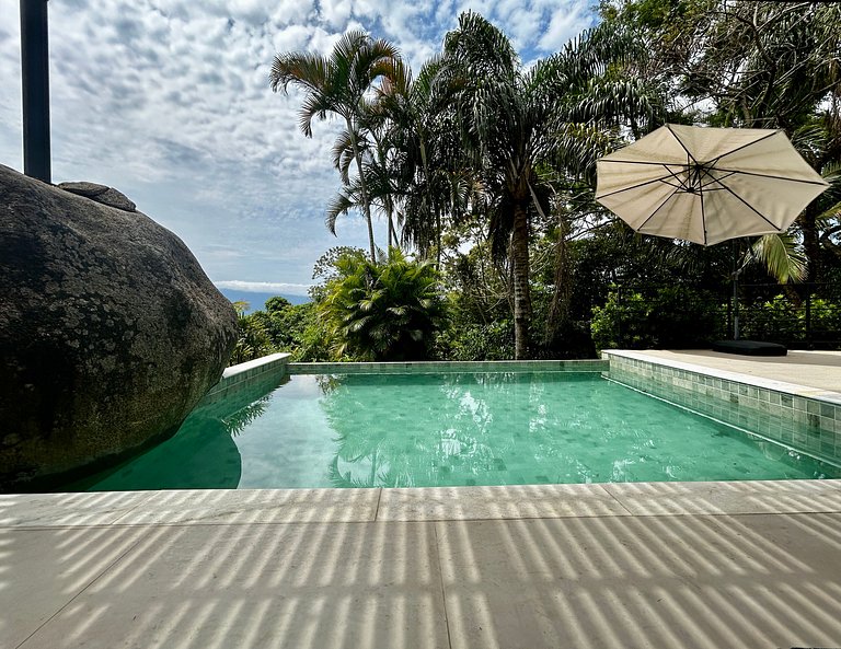 Experiência mar, montanha, piscina e churrasqueira