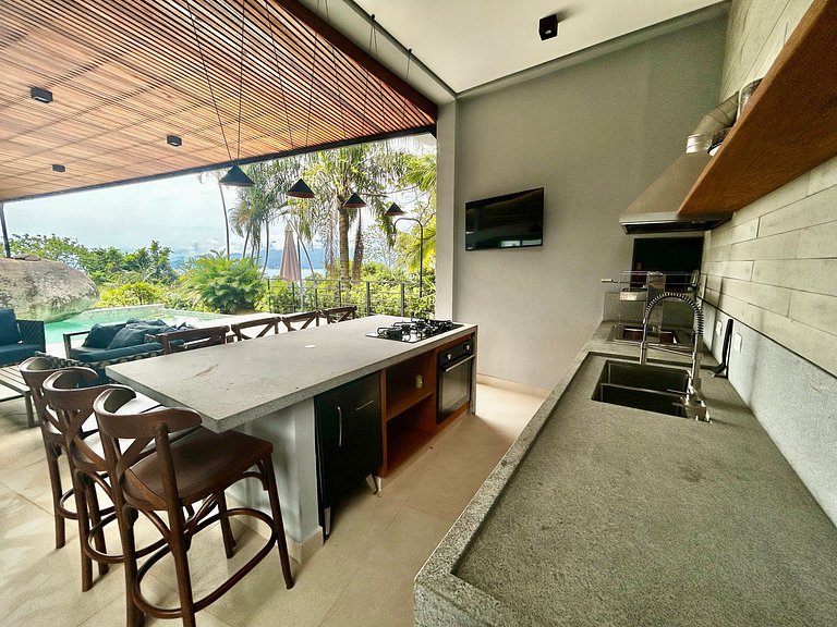 Experiência mar, montanha, piscina e churrasqueira