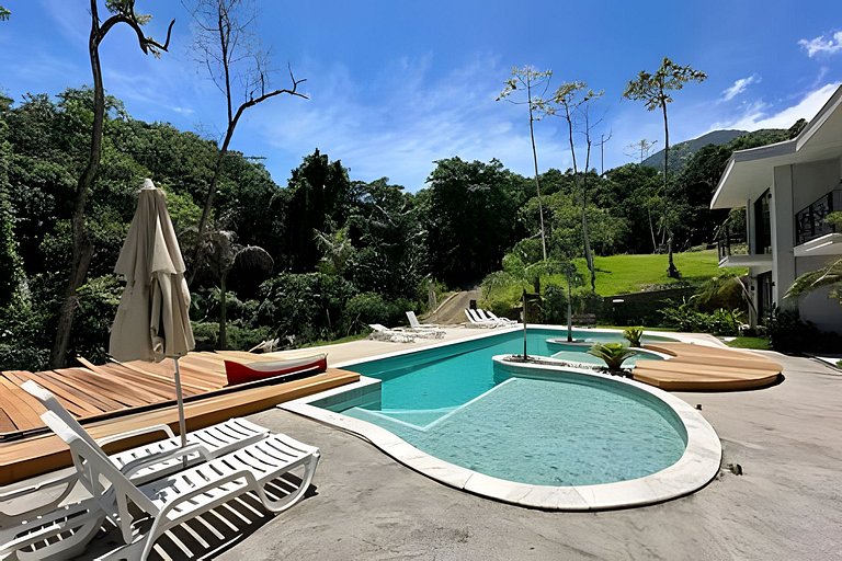 Flat em frente a Praia do Veloso