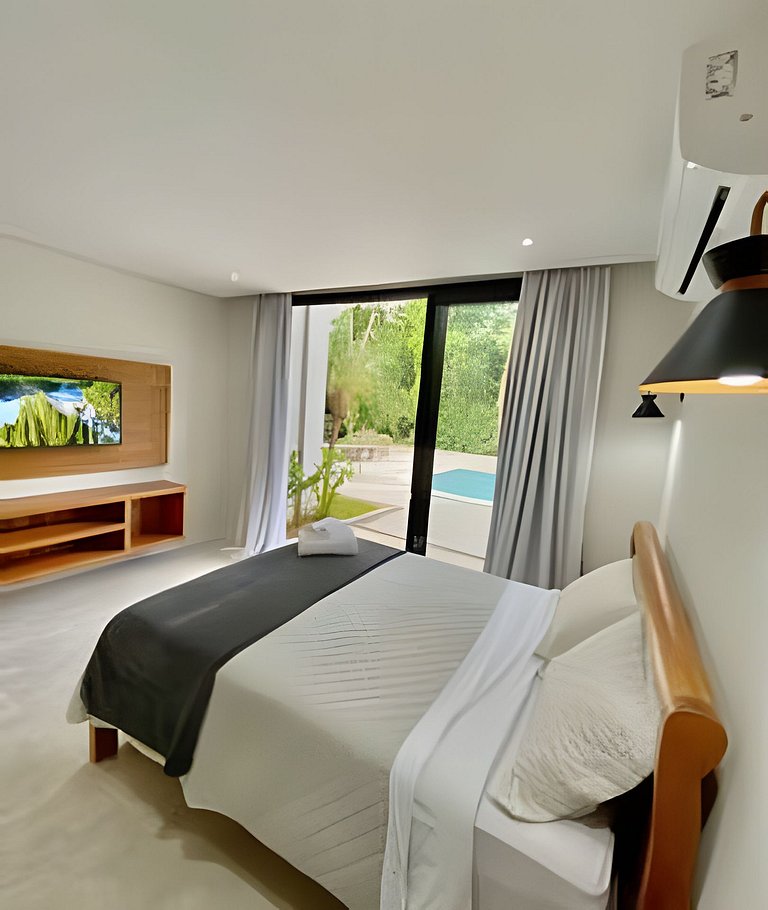 Flat em frente a Praia do Veloso