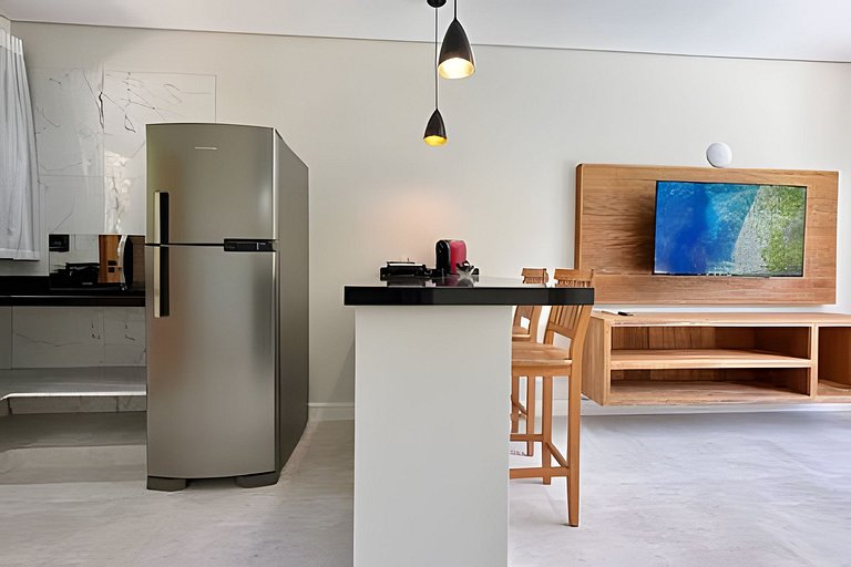 Flat em frente a Praia do Veloso