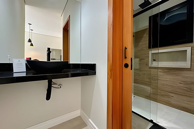 Flat em frente a Praia do Veloso