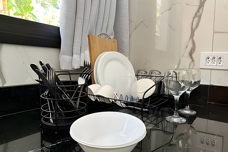 Flat em frente a Praia do Veloso