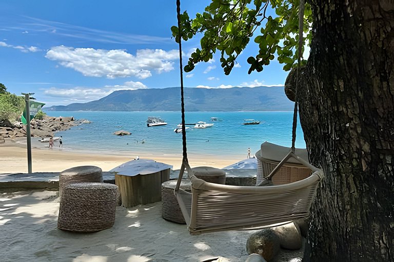 Flat em frente a Praia do Veloso