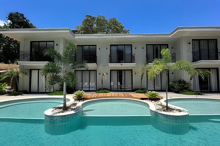 Flat em frente a Praia do Veloso