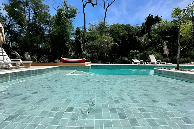 Flat em frente a Praia do Veloso