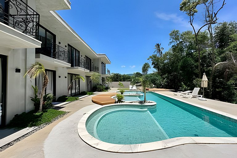 Flat em frente a Praia do Veloso