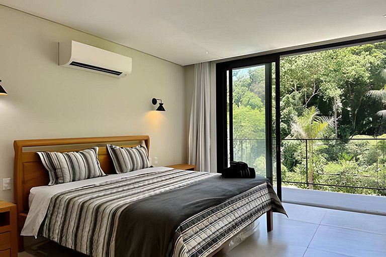 Flat em frente a Praia do Veloso