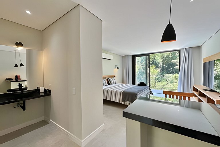 Flat em frente a Praia do Veloso