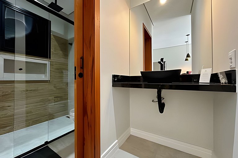 Flat em frente a Praia do Veloso