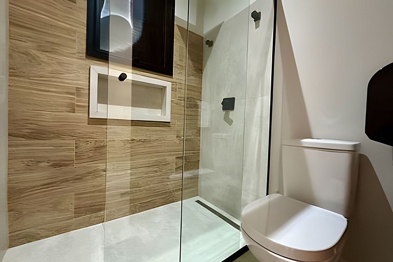 Flat em frente a Praia do Veloso