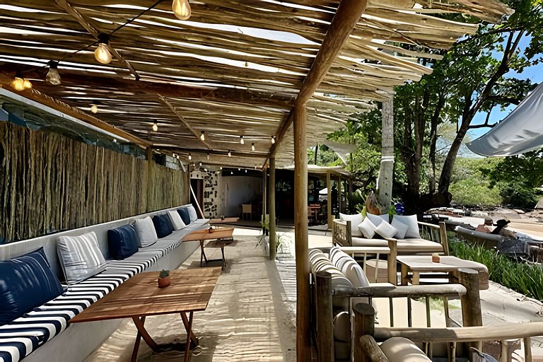 Flat em frente a Praia do Veloso