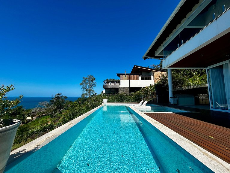 Casa contemporênea, piscina aquecida e bela vista