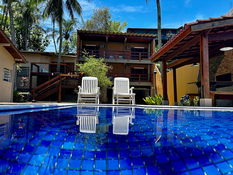 Casa a 30m da praia , piscina e churrasqueira