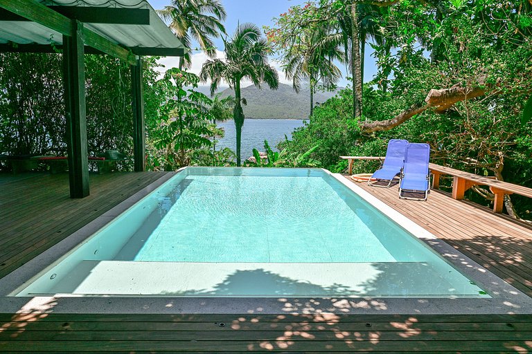 Casa pé na areia, piscina e conexão com a natureza