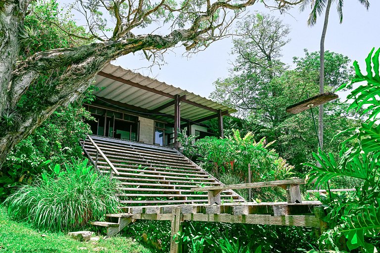 Casa pé na areia, piscina e conexão com a natureza