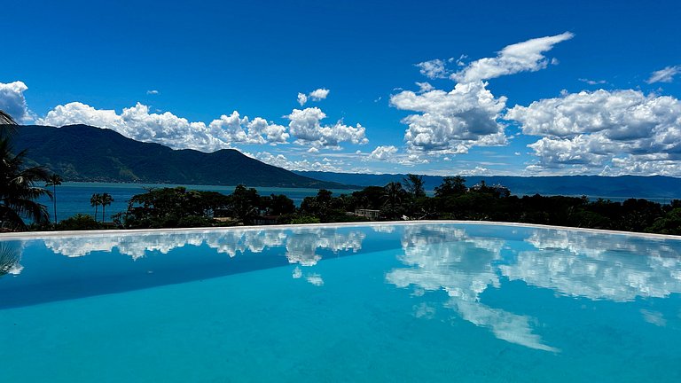 A 150m da praia, piscina aquecida e vista