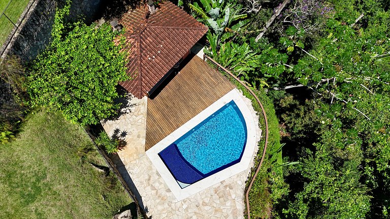 Casa em condomínio, piscina aquecida e vista