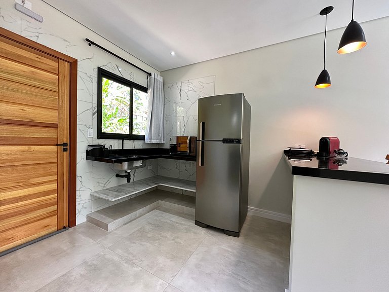 Flat em frente a Praia do Veloso