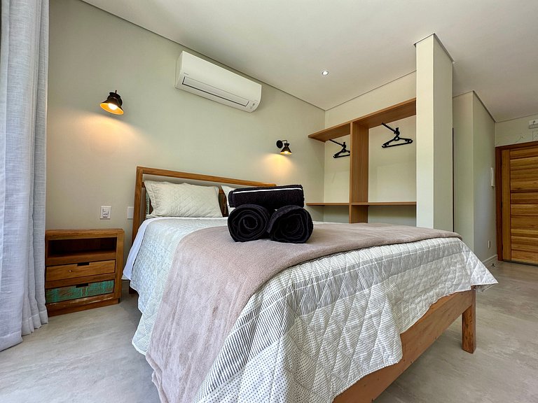 Flat em frente a Praia do Veloso