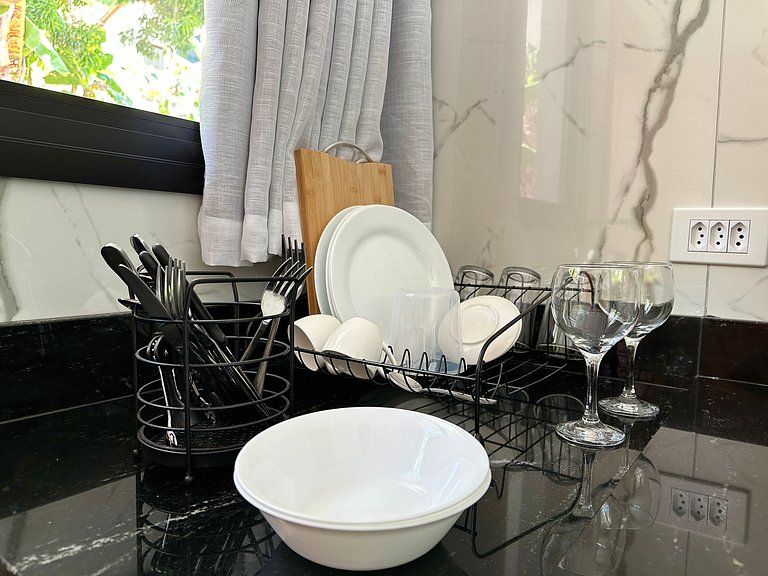 Flat em frente a Praia do Veloso