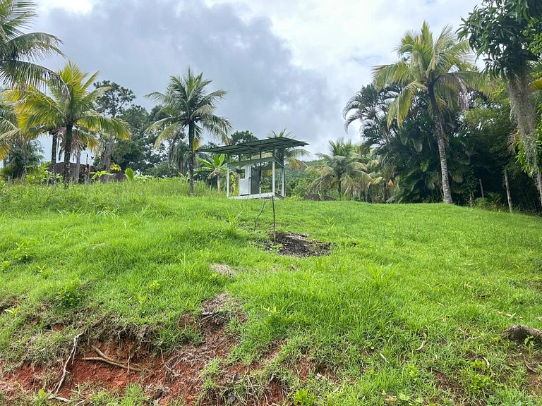 Casa Caiçara Autêntica com Conforto e Natureza Exuberante