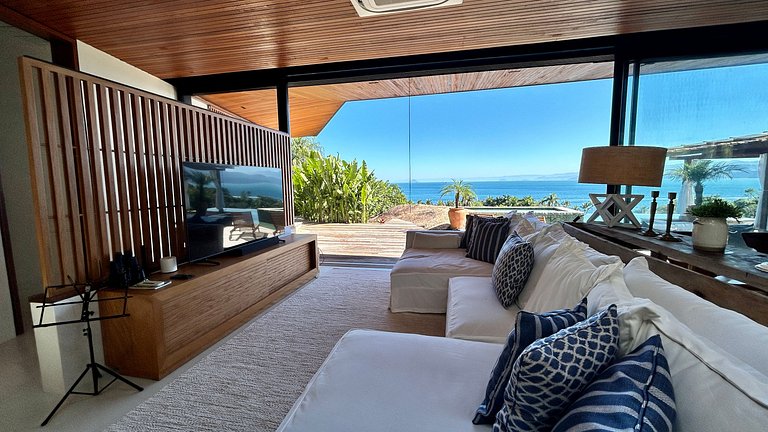 Vista mar, casa moderna e condomínio costeiro