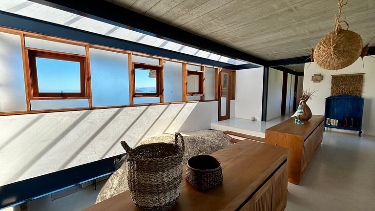 Vista mar, casa moderna e condomínio costeiro