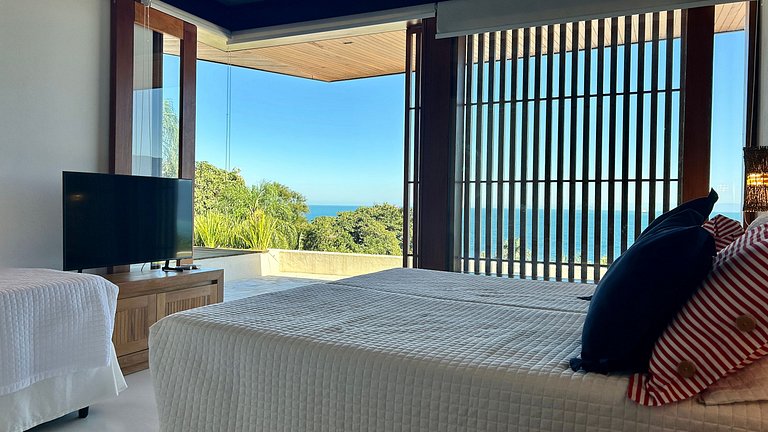 Vista mar, casa moderna e condomínio costeiro