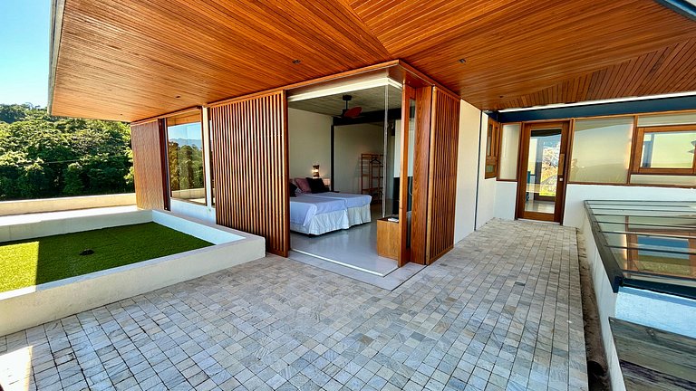 Vista mar, casa moderna e condomínio costeiro